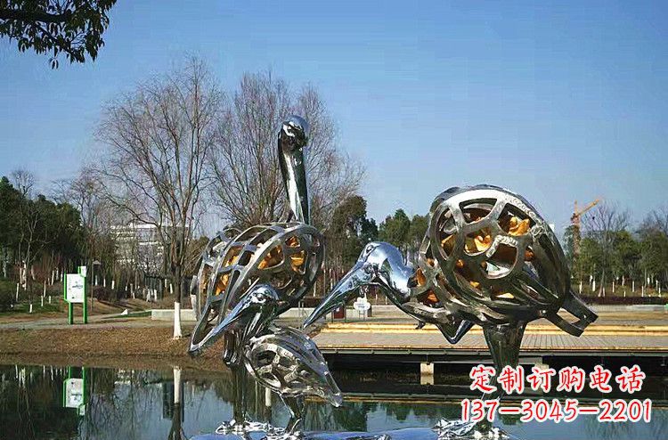 山东公园不锈钢丹顶鹤一家雕塑