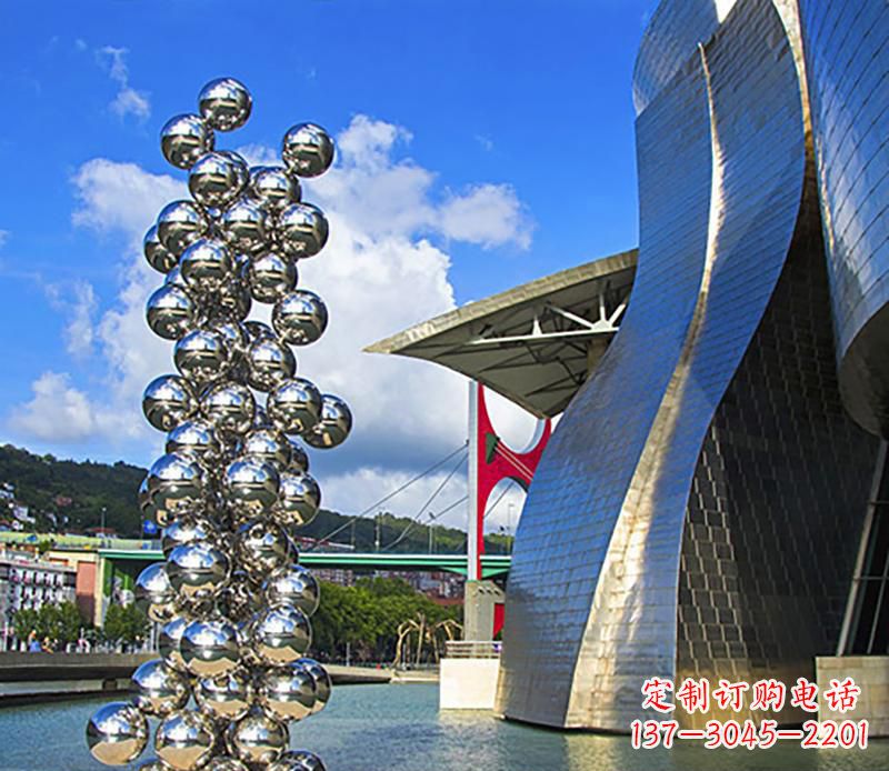 山东高端不锈钢抽象龙柱雕塑