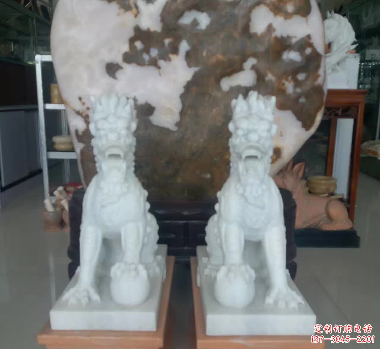 山东汉白玉踩球麒麟石雕