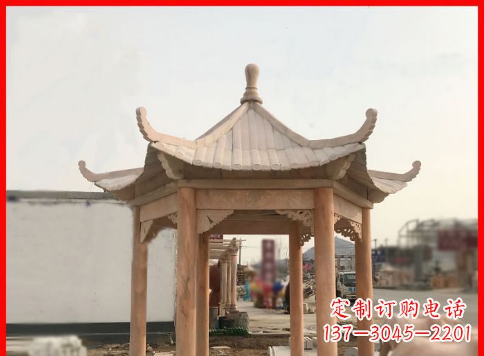 山东晚霞红公园六角石雕凉亭