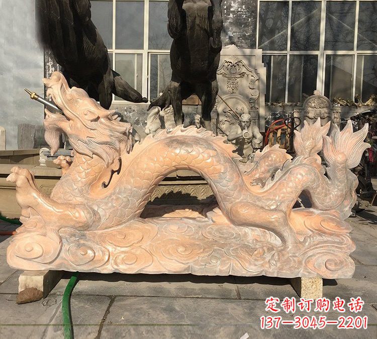 山东晚霞红石雕喷水龙